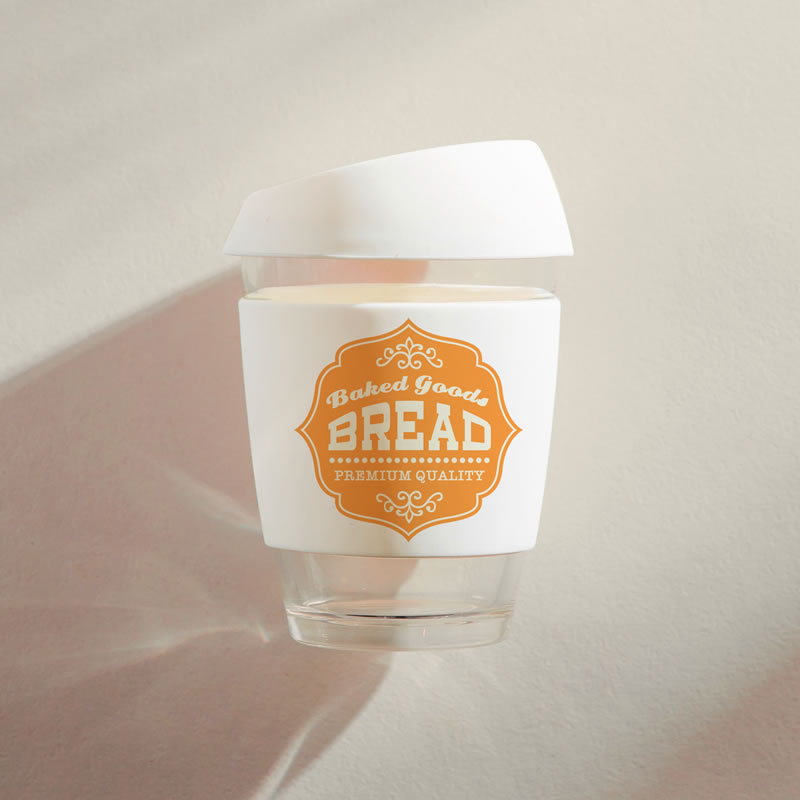 An image showing a glass travel mug.